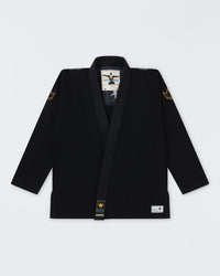 Kingz Legends Never Die Respect Youth Gi in Black – flat lay: black gi gold crown shoulder patches Kingz label hem embroidered logo