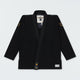 Kingz Legends Never Die Respect Women's Gi in Black – flat lay: black gi gold crown shoulder patches Kingz logo lapel tag white inner label