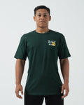 Kingz Conquer Tee Dark Green - Full Body Front View Male Athlete Short Sleeve Dark Green Tee White "Kingz Conquer" Text Left Chest Crown Graphic Streetwear Casual Apparel [color:Dark Green]