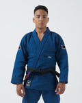 Kingz Ultralight 2.0 Jiu Jitsu Gi Blue - Front View Male Athlete Blue Gi Black Belt Crown Badge Sleeves Ultra Light Text Chest KINGZ Patch Hem BJJ Kimono Training [color:Blue]