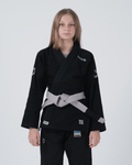 Kingz Nano 3.0 Youth BJJ Gi Black - Upper Body Front View Girl Athlete Gray Belt NANO Text Crown Logo 380gsm Youth Kids Size