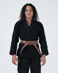 Kingz Ultralight 2.0 Women's Jiu Jitsu Gi Black - Front View Female Athlete Black Out Limited Edition Solid Black Design Subtle Logo Right Arm Durable Fabric BJJ Kimono Training [color:Black]