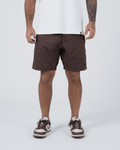 Kingz Casual Gi Shorts Brown Dark Chocolate - Full Body Front View Male Athlete Dark Brown Ripstop Casual Shorts Above-Knee Cut Drawstring Waistband Black Woven Kingz Label Right Thigh White T-Shirt Brown Nike Dunk Sneakers Men's BJJ Lifestyle [color:Earthy brown]