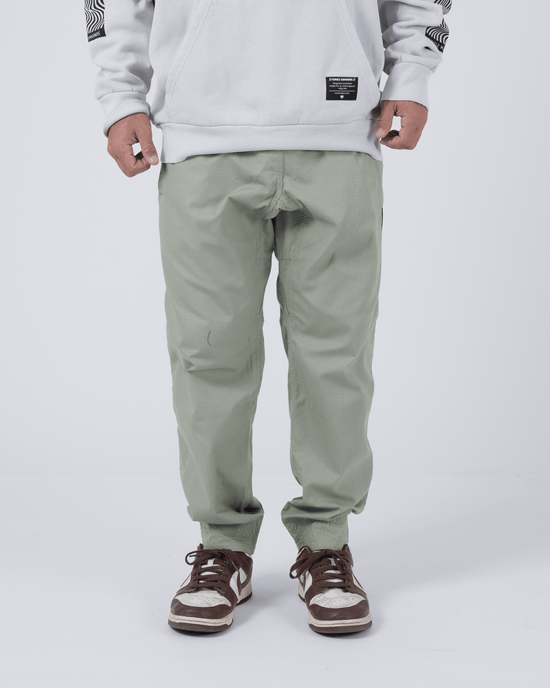 Kingz Casual Rip Stop Gi Pant Stone Green - Front View Male Athlete Sage Tone Durable Ripstop Fabric Relaxed Fit Elastic Ankles Minimalist Design BJJ Gi Training Apparel [color:Stone Green]