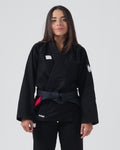 Kingz Kore V2 Women's BJJ Gi Black - Upper Body Front View Female Athlete Black Belt Red Bar Crown Logo KINGZ Patch 380gsm