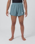 Kingz Hybrid Women's Shorts Sage - Full Body Front View Female Athlete Sage Blue-Green Color White Crown Logo Left Thigh High-Rise Elastic Waistband Competition Cut Women's Grappling Shorts No-Gi BJJ [color:Sage]