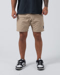 Kingz Casual Gi Shorts Khaki - Front View Male Athlete Khaki Shorts Black Label Patch Right Leg Relaxed Fit Above Knee Length No-Gi Compression Training [color:KHAKI]