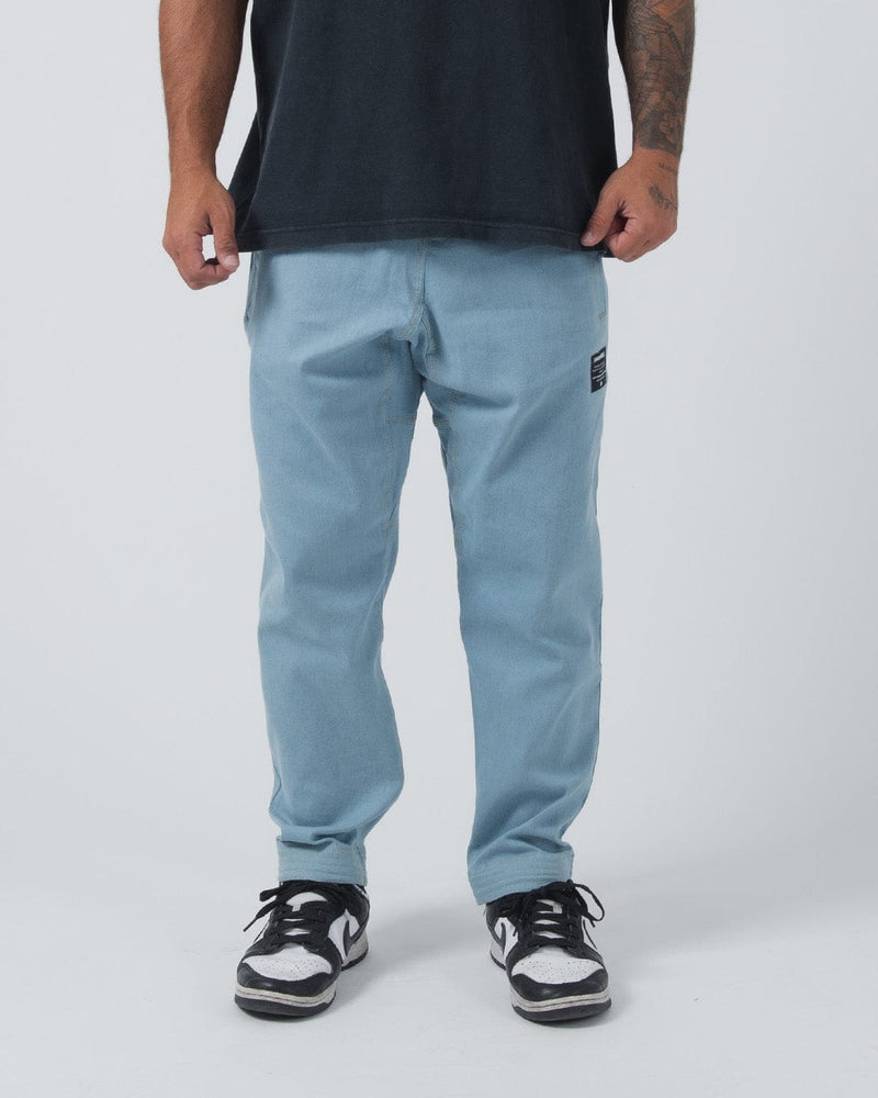 Kingz Casual Gi Pant Light Denim - Front View Male Athlete Light Denim Color Black Label Patch Right Thigh Relaxed Fit BJJ Gi Training [color:Light Denim]