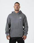 Grey BJJ hoodie front view on adult male model showing Pursue The Gentle Art rose chest graphic [color:Grey]
