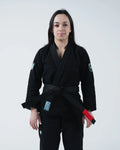 Kingz Balistico 4.0 Women's Jiu Jitsu Gi Black - Full Body Front View Female Athlete Black Gi White Crown Shoulder Patch Blue Label Red Belt Tip Durable Stitching BJJ Gi Training [color:Black]