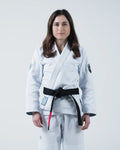 Kingz Balistico 4.0 Women's Jiu Jitsu Gi White - Front View Female Athlete Black Belt White Gi Embroidered Patches Crown Logo Sleeves Durable Fabric Tailored Fit BJJ Gi Training Competition [color:White]