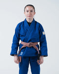 Kingz The ONE V2 Women's Jiu Jitsu Gi Blue - Full Body Front View Female Athlete Blue Gi Crown Badge Left Arm KINGZ Logo Bottom Hem Contrast Stitching Durable Fabric BJJ Gi [color:Blue]
