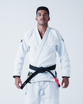 Kingz Legends Never Die Respect Gi in White – full body front view on male model: white gi black belt crown logo shoulder patch contrast stitching