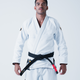 Kingz Legends Never Die Respect Gi in White – full body front view on male model: white gi black belt crown logo shoulder patch contrast stitching