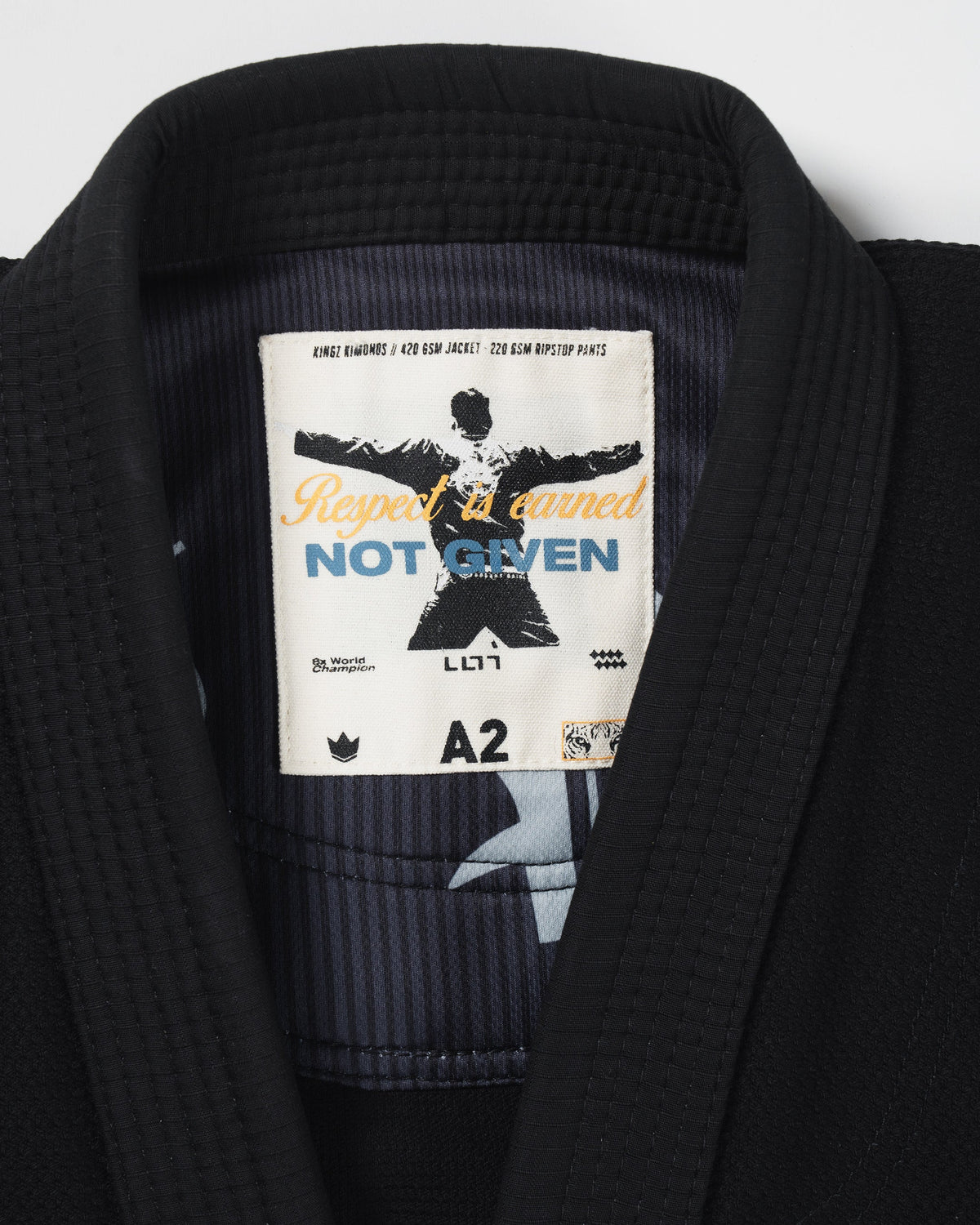 Kimono Kingz Legends Never Die Respect para jóvenes de BJJ - Negro