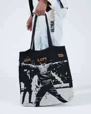 Kingz Legends Never Die Respect Women's Gi in White – close-up side view: ULTRALIGHT text black white gi pants bold graphic tote bag