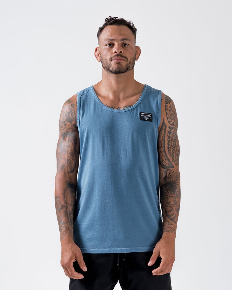 Kingz Game Changer Tank Blue - Full Body Front View Male Athlete Blue Tank Black Label Left Chest Tattooed Arms Relaxed Fit Streetwear [color:Blue]