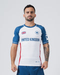 Kingz Jersey Rashguard - UK White Blue - Full Body Front View Male Athlete White Base Blue Sleeves Red Side Panels Union Jack Flag Crown Badge Left Chest UNITED KINGDOM Text BJJ Rash Guard