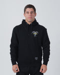 Kingz Ascend Hoodie Black - Front View Male Athlete Black Hoodie White Drawstrings Graphic Text Left Chest Kangaroo Pocket Streetwear [color:Black]